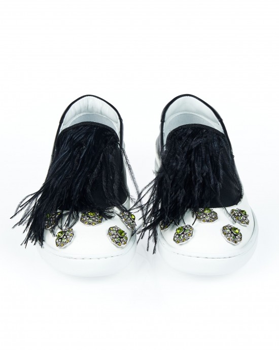Round Toe Two-tone Slip On With Jewel Appliqué On The Tip. Feather Insert On Contrasting Tongue. Rubber Sole.