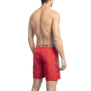 Swim Shorts With Layering Detail. Elastic Waistband With Drawstring. Second Internal Band With Logo.