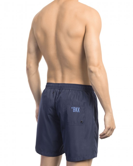 Swim Shorts With Side Print. Side Pockets And One On The Back. Elastic Waistband With Drawstring.