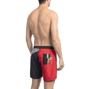 Swim Shorts With Side Print. Side Pockets And One On The Back. Elastic Waistband With Drawstring.