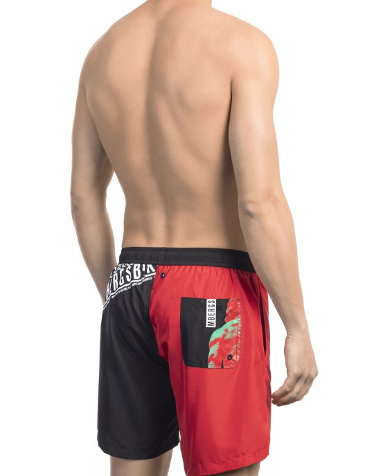 Swim Shorts With Side Print. Side Pockets And One On The Back. Elastic Waistband With Drawstring.