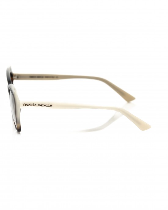 Cat Eye Model Eyeglasses. Frame With Turtle Pattern. Cream Color Profile And Temples.