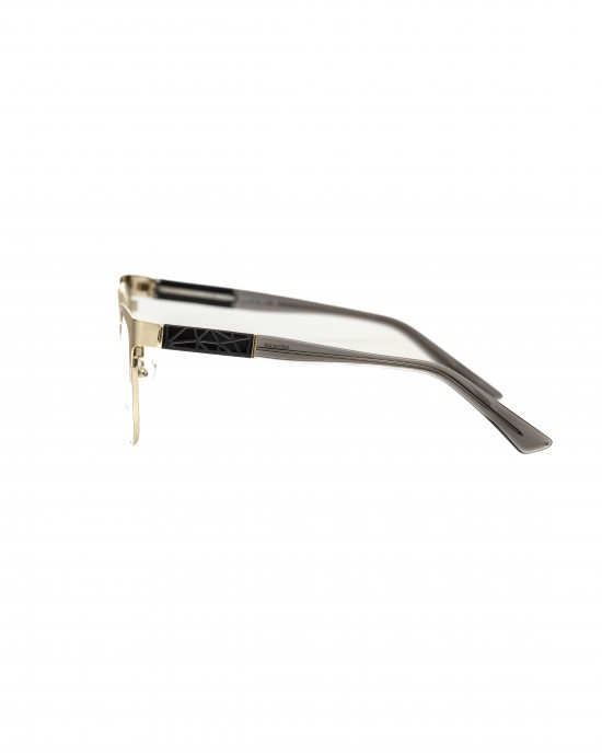 Clubmaster Model Eyeglasses. Upper Profile In Gold Colored Metal. Black And Transparent Temple With Geometric Pattern.