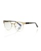 Clubmaster Model Eyeglasses. Upper Profile In Gold Colored Metal. Black And Transparent Temple With Geometric Pattern.