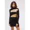 Long-sleeved Knitted Dress. Laminated Effect Application. Polo Neck. Without Pockets. Solid Color.