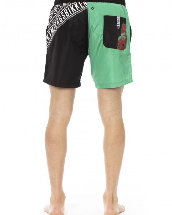 Swim Shorts With Side Print. Side Pockets And One On The Back. Elastic Waistband With Drawstring.