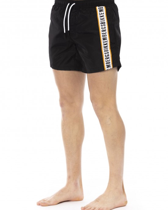 Swim Shorts With Tape. Two Side Pockets And One On The Back. Elastic Waistband With Drawstring.