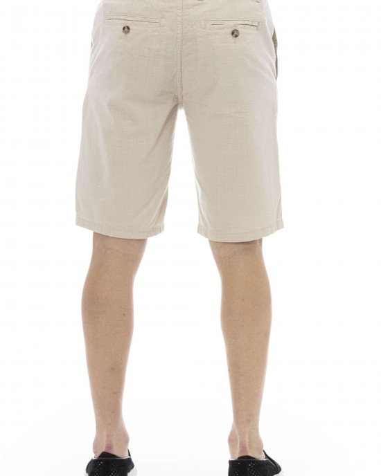 Bermuda Shorts. Solid Color Fabric. Front Zipper And Button Closure. Side Pockets. Back Welt Pockets.