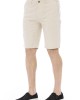 Bermuda Shorts. Solid Color Fabric. Front Zipper And Button Closure. Side Pockets. Back Welt Pockets.