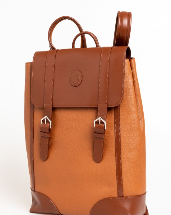 Leather Backpack. Closure With Magnetic Buttons. Internal Compartments. Front Logo. 33*44*12