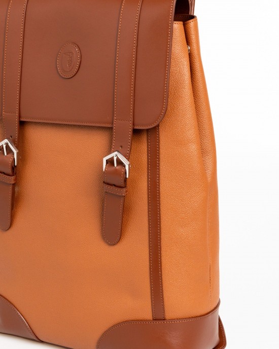 Leather Backpack. Closure With Magnetic Buttons. Internal Compartments. Front Logo. 33*44*12