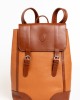 Leather Backpack. Closure With Magnetic Buttons. Internal Compartments. Front Logo. 33*44*12