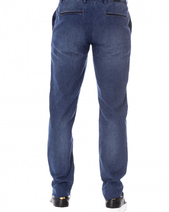 Jeans. Front Zipper And Button Closure. Side Pockets. Back Welt Pockets.