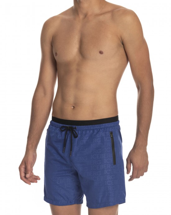Beach Shorts With Print. Front Logo. Side Pockets. Rear Welt Pockets. Elasticized Waistband With Drawstring.