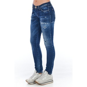Skinny Denim Jeans With A Worn Wash. Multi-pockets. Front Closure With Zip And Button.