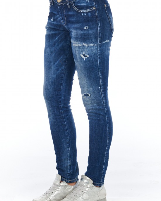 Skinny Denim Jeans With A Worn Wash. Multi-pockets. Front Closure With Zip And Button.