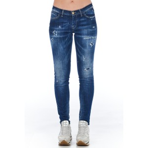 Skinny Denim Jeans With A Worn Wash. Multi-pockets. Front Closure With Zip And Button.
